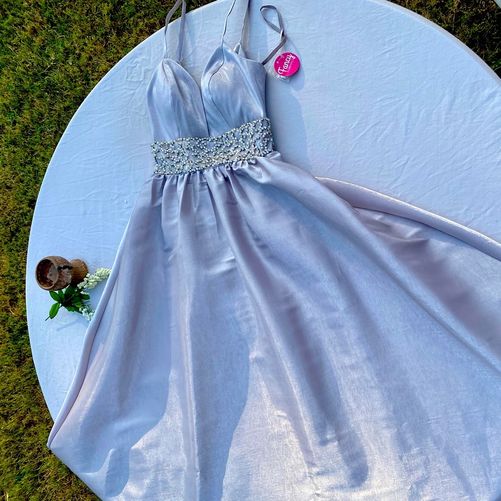 Silver Shimmer formal dress with bead work. Val Stefani.